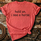 Hold on, I see a horse