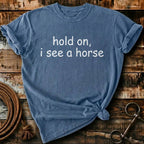 Hold on, I see a horse