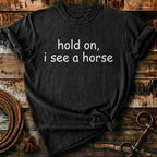 Hold on, I see a horse